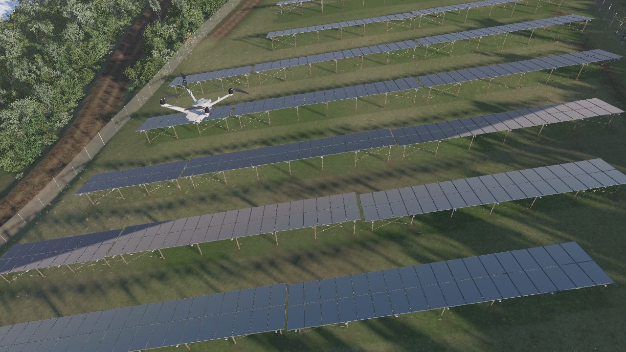 The drone patrolling over rows of solar panels by day